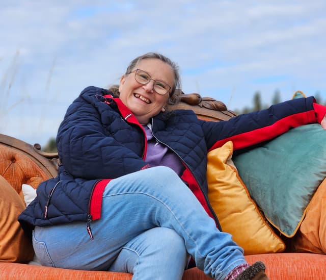 Happy traveler on a couch